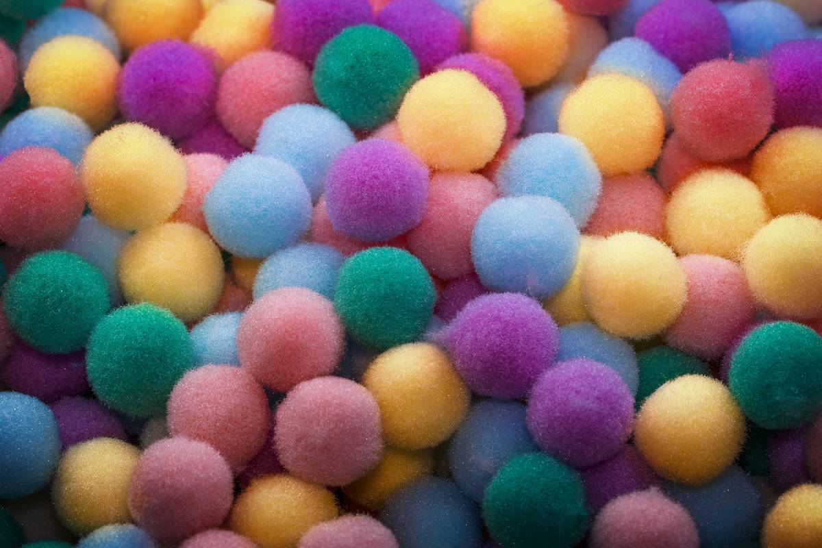Side-by-side comparison: frayed plastic bead garland vs. intact wool felt ball strand after one holiday season